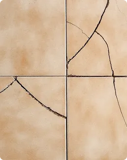A cracked floor tile